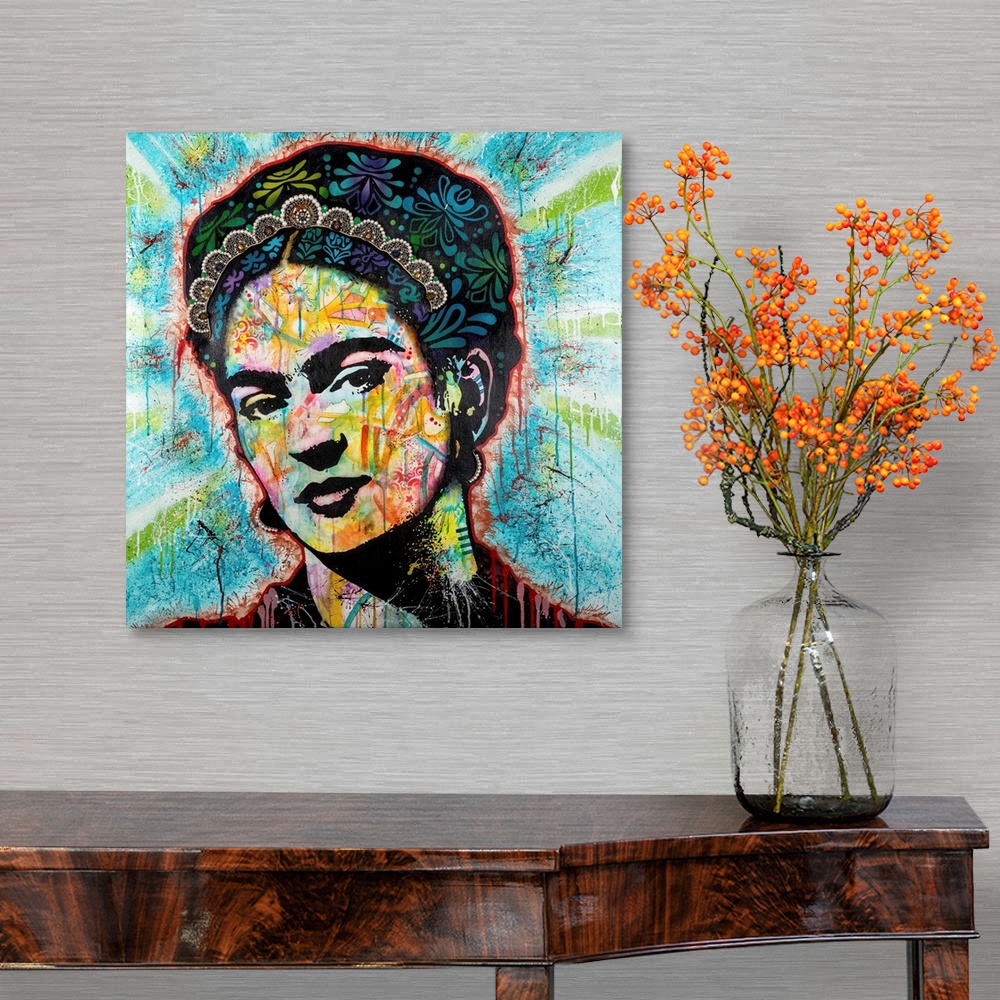 A traditional room featuring Pop art style art with a portrait of Frida outlined in red drippy paint on a blue background with...