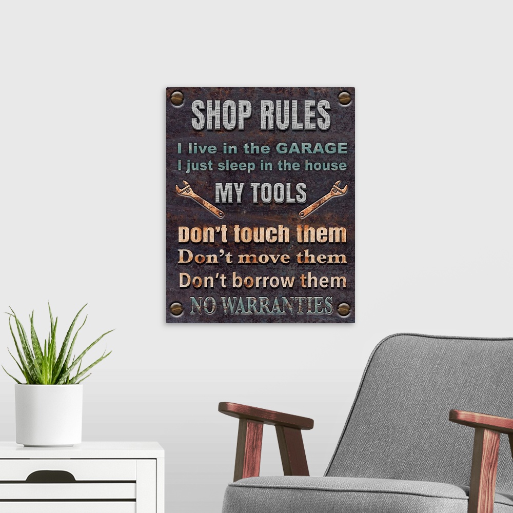 A modern room featuring Contemporary home decor artwork of a rustic looking garage shop sign with shop rules.