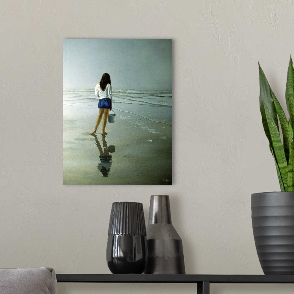 A modern room featuring Contemporary painting of a young woman on the beach holding a pail.