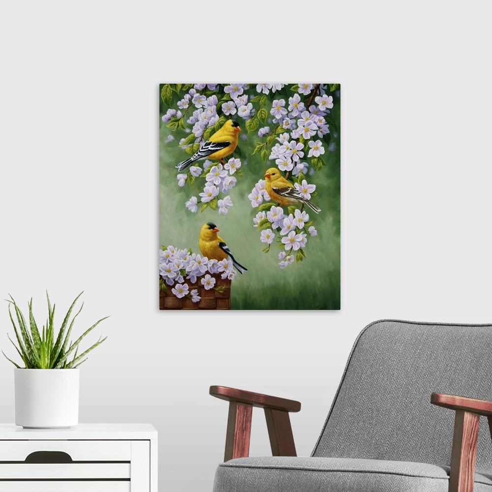 A modern room featuring Three goldfinches perched on branches of a blossoming tree.