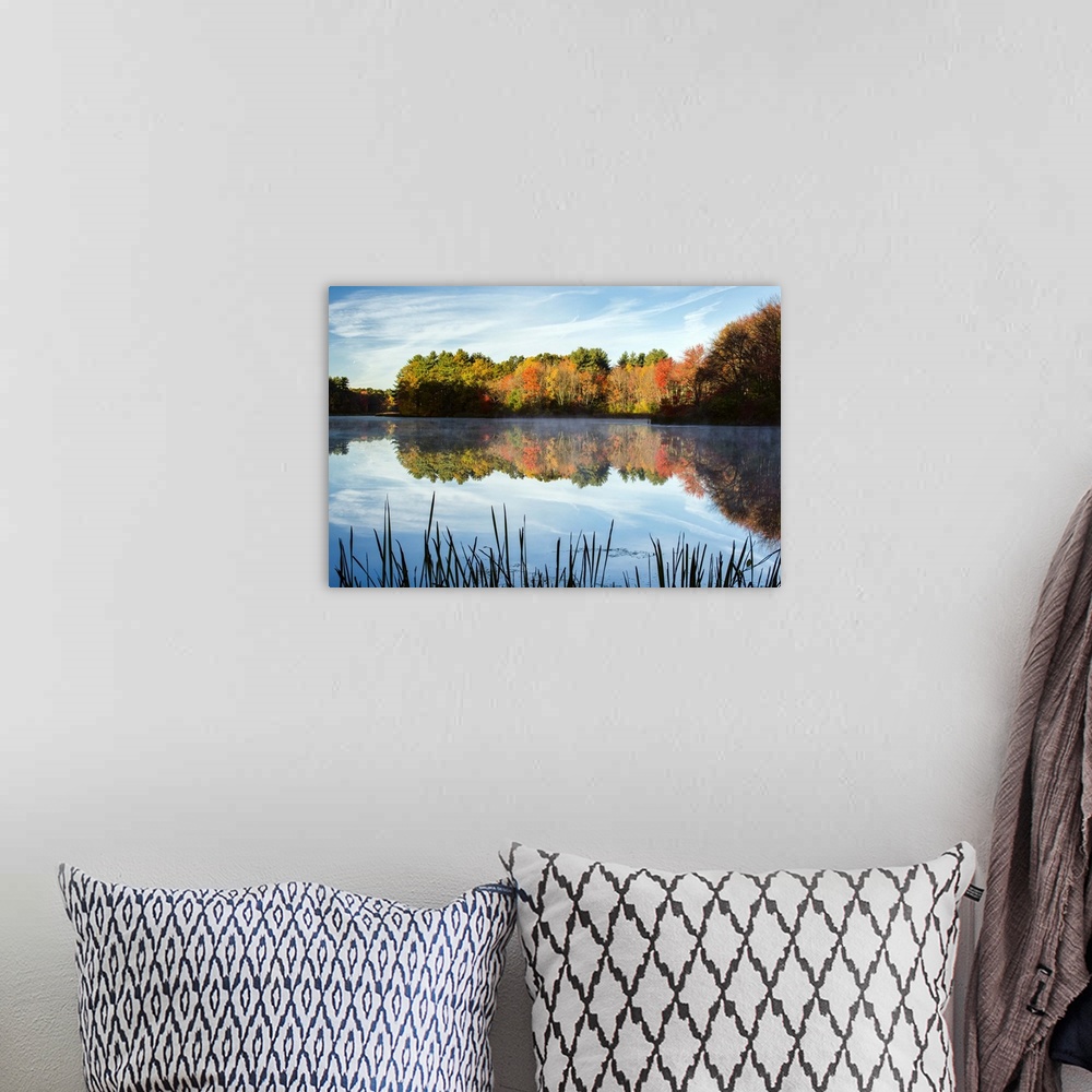 A bohemian room featuring Landscape photograph of Grist Millpond, Massachusetts, with Fall trees reflecting on to the water.