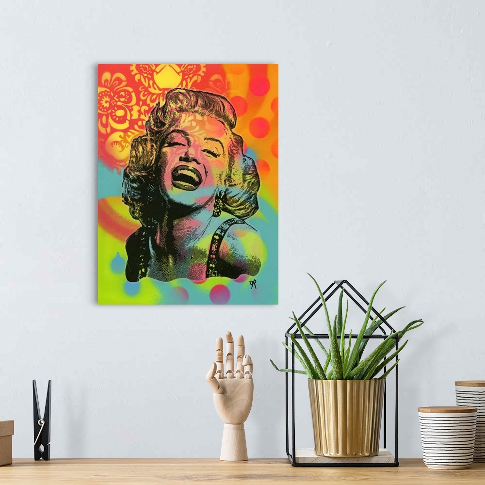 A bohemian room featuring Pop art style illustration of Marilyn Monroe with a playful and vibrant spray painted background.