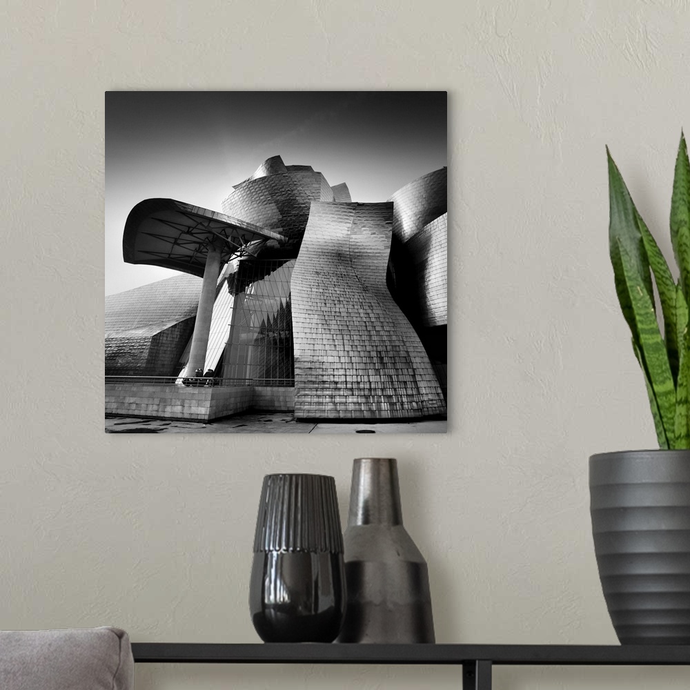 A modern room featuring Guggenheim Bilbao, black and white photography