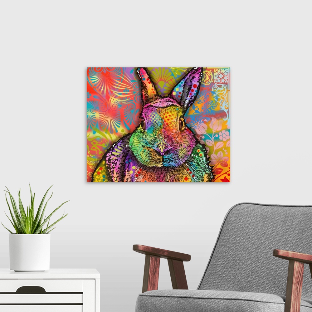 A modern room featuring Very colorful painting of a rabbit with abstract and floral designs all over.