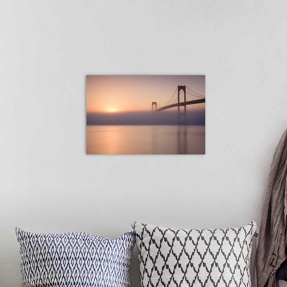 A bohemian room featuring Beautiful photograph of the Golden Gate Bridge with heavy fog over the Bay and a warm sunrise.