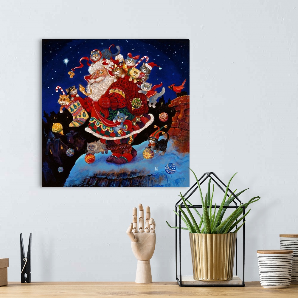A bohemian room featuring Contemporary painting of jolly St. Nick covered in cats on a snowy roof.