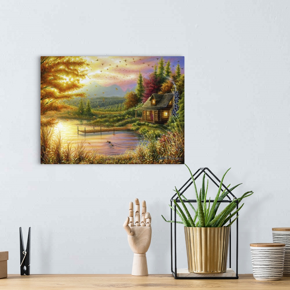 A bohemian room featuring A contemporary idyllic painting of a lake cottage at sunset.