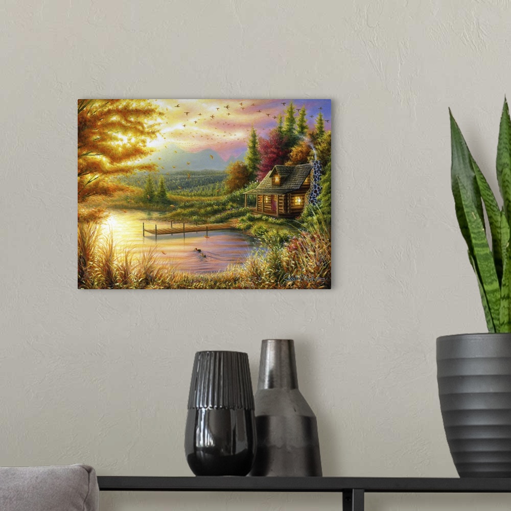 A modern room featuring A contemporary idyllic painting of a lake cottage at sunset.
