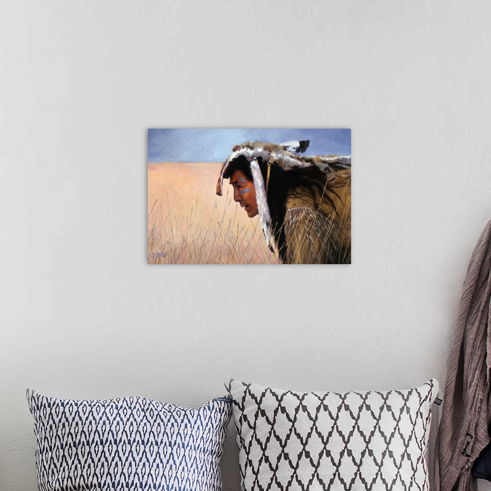 A bohemian room featuring Contemporary western theme painting of a native American man kneeling in tall grass on the plains.