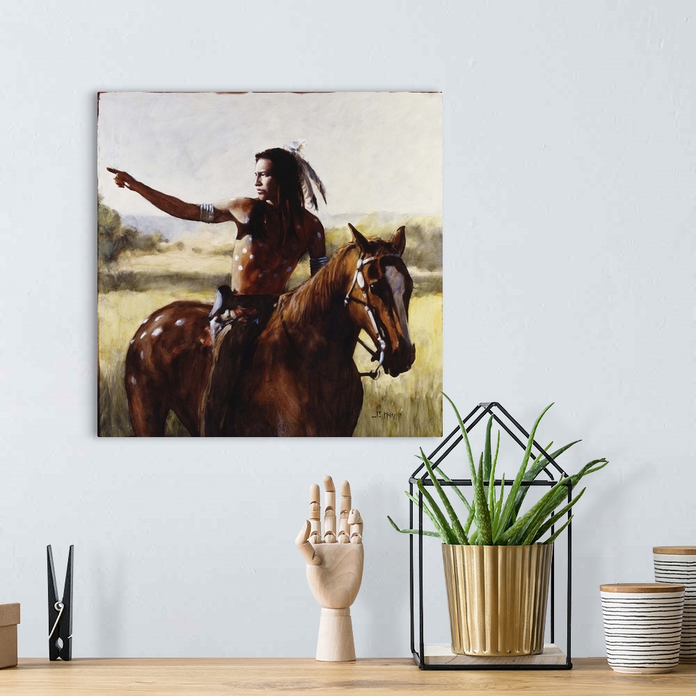 A bohemian room featuring Contemporary western theme painting of a native American man on horseback pointing to something i...
