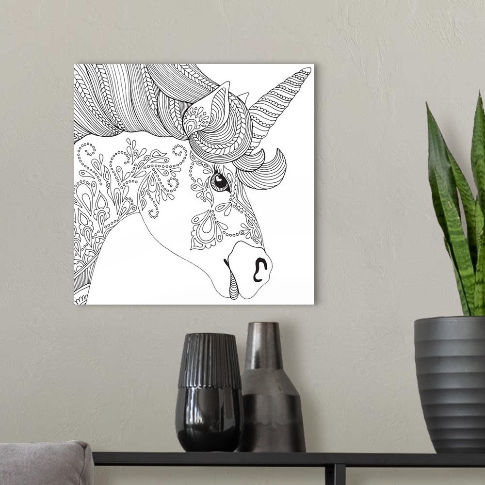 A modern room featuring Contemporary line art of the head of a unicorn with uniquely designed patterns on the face and neck.