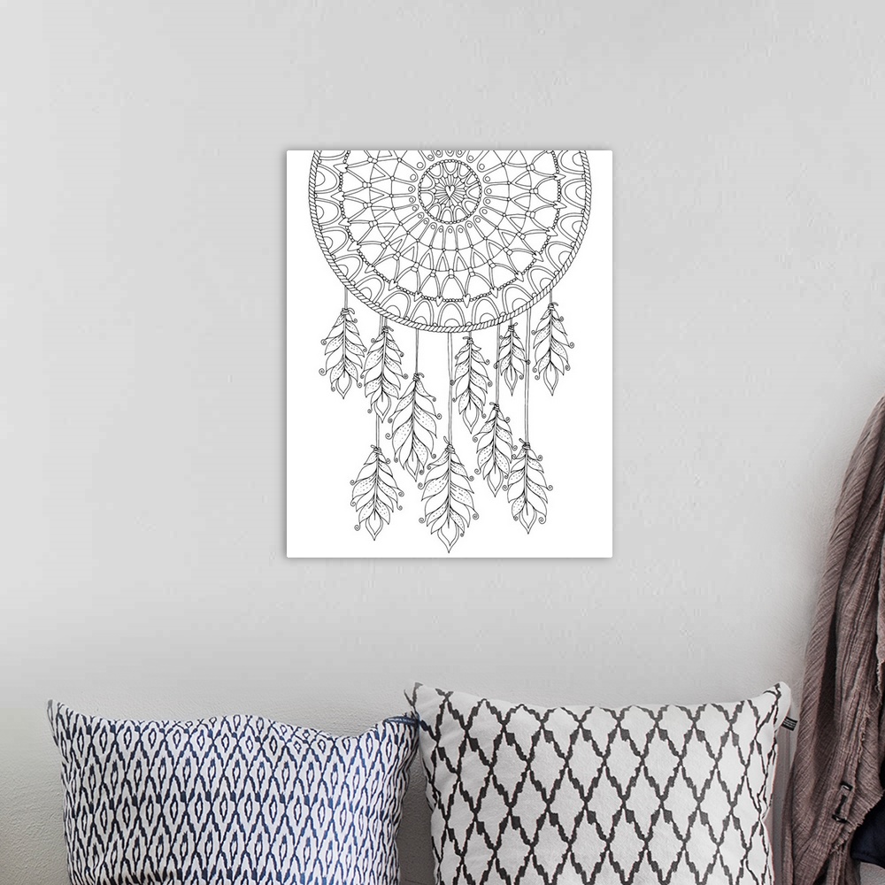 A bohemian room featuring Black and white line art of a dream catcher with feathers hanging from it.