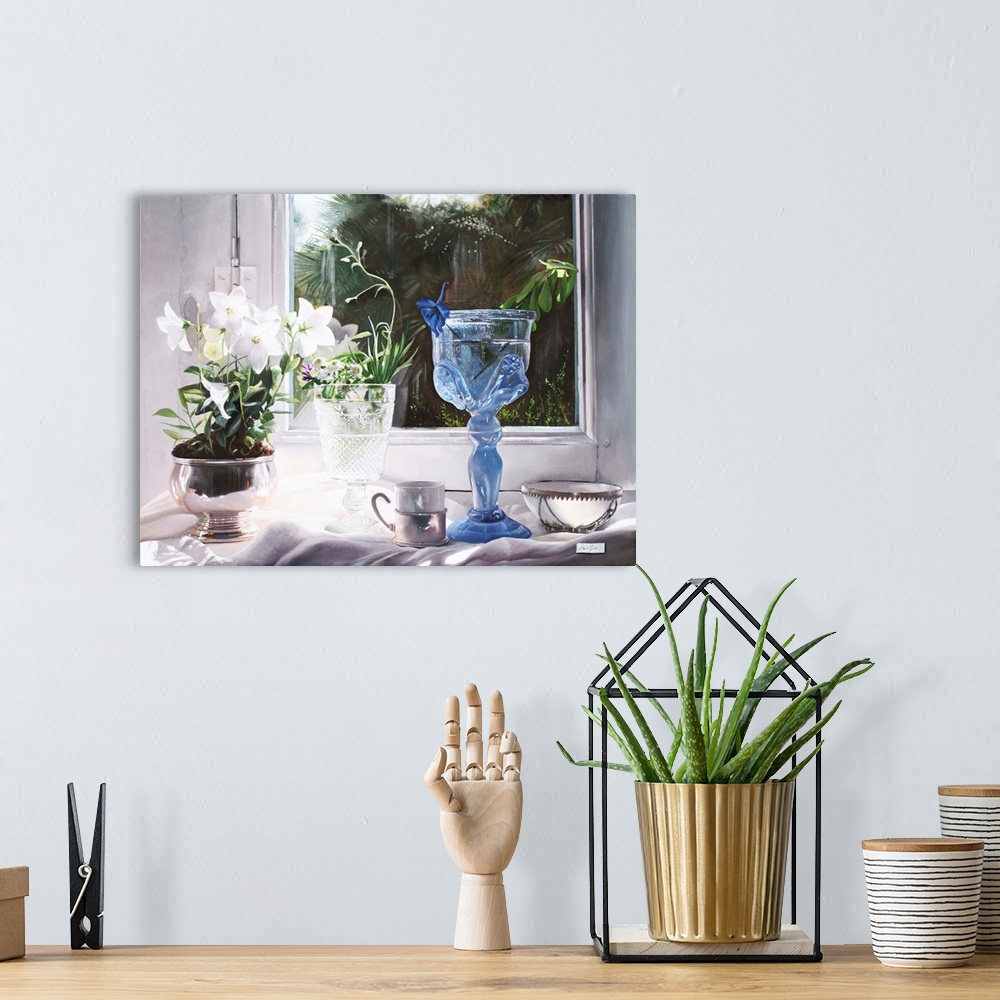 A bohemian room featuring Contemporary still life painting of a blue glass goblet sitting near a window.