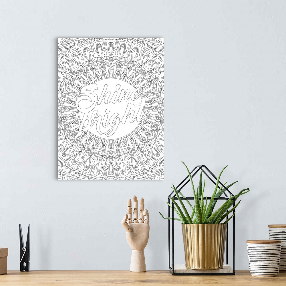 A bohemian room featuring Inspirational black and white line art with the phrase "Shine Bright" in the center and an intric...