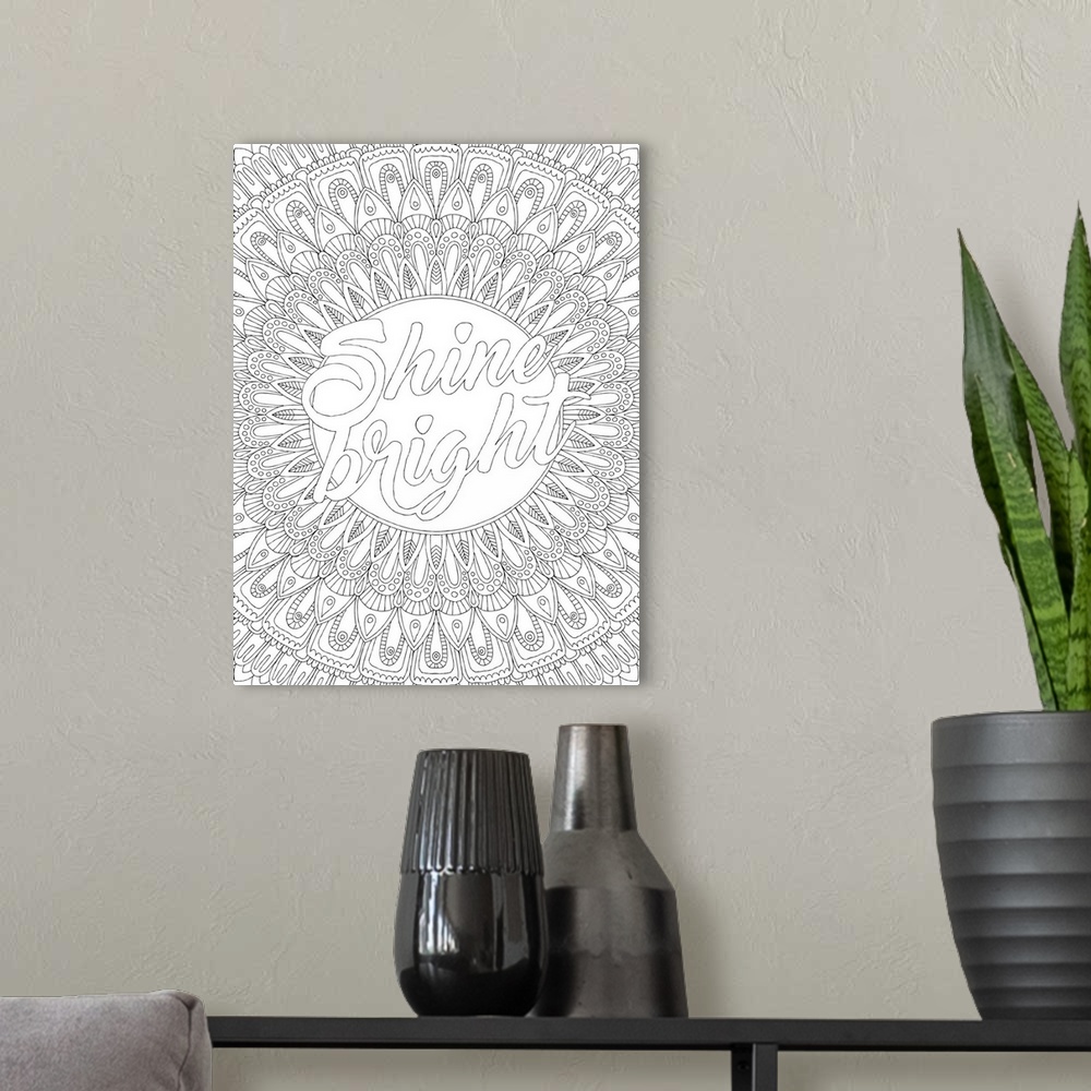 A modern room featuring Inspirational black and white line art with the phrase "Shine Bright" in the center and an intric...