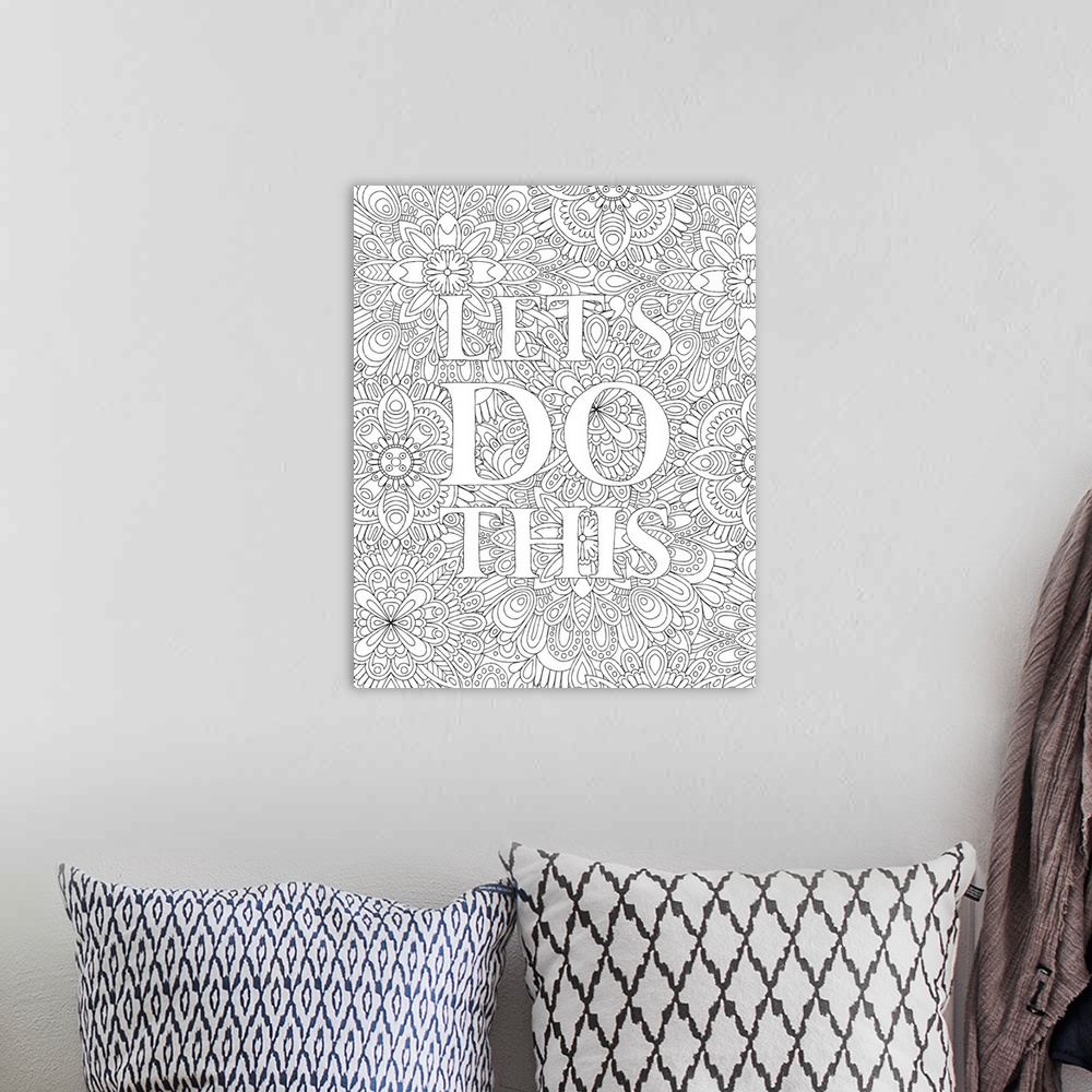 A bohemian room featuring Inspirational black and white line art with the phrase "Let's Do This" on top of an intricate flo...