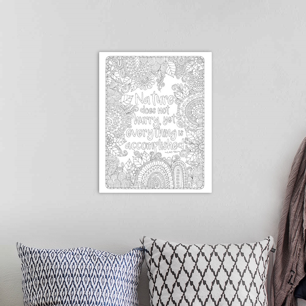 A bohemian room featuring Nature themed black and white line art withe the quote "Nature Does Not Hurry, Yet Everything is ...