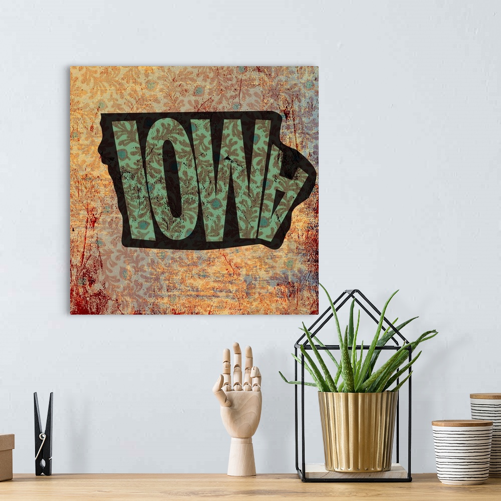 A bohemian room featuring Contemporary typography art of a state outline against a grungy distressed background.
