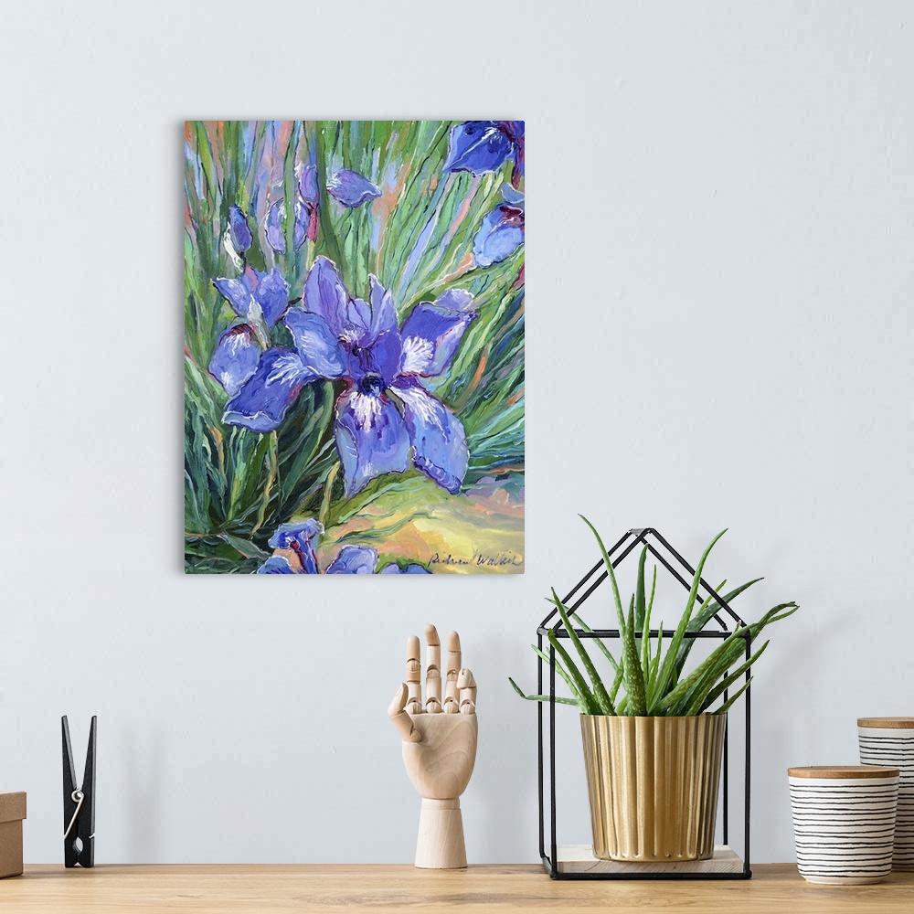 A bohemian room featuring Painting of purple iris's.