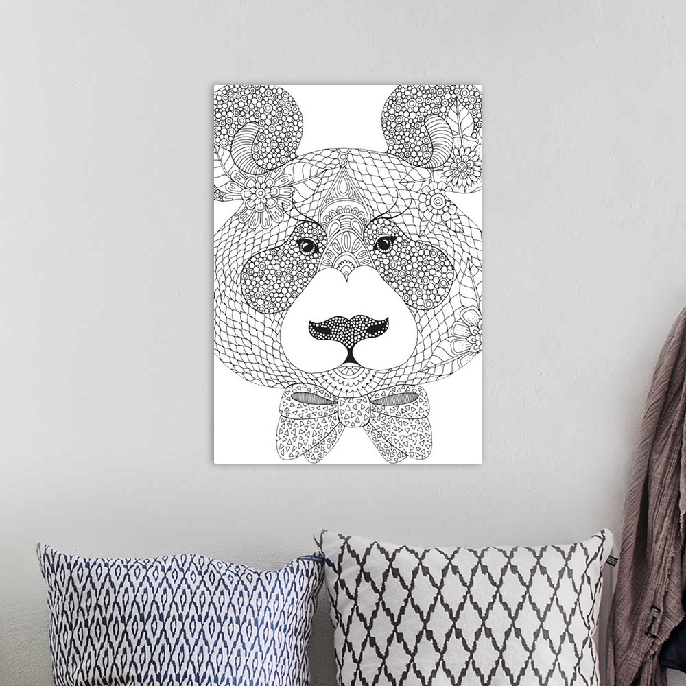 A bohemian room featuring Black and white line art of a uniquely designed bear wearing a bow tie.