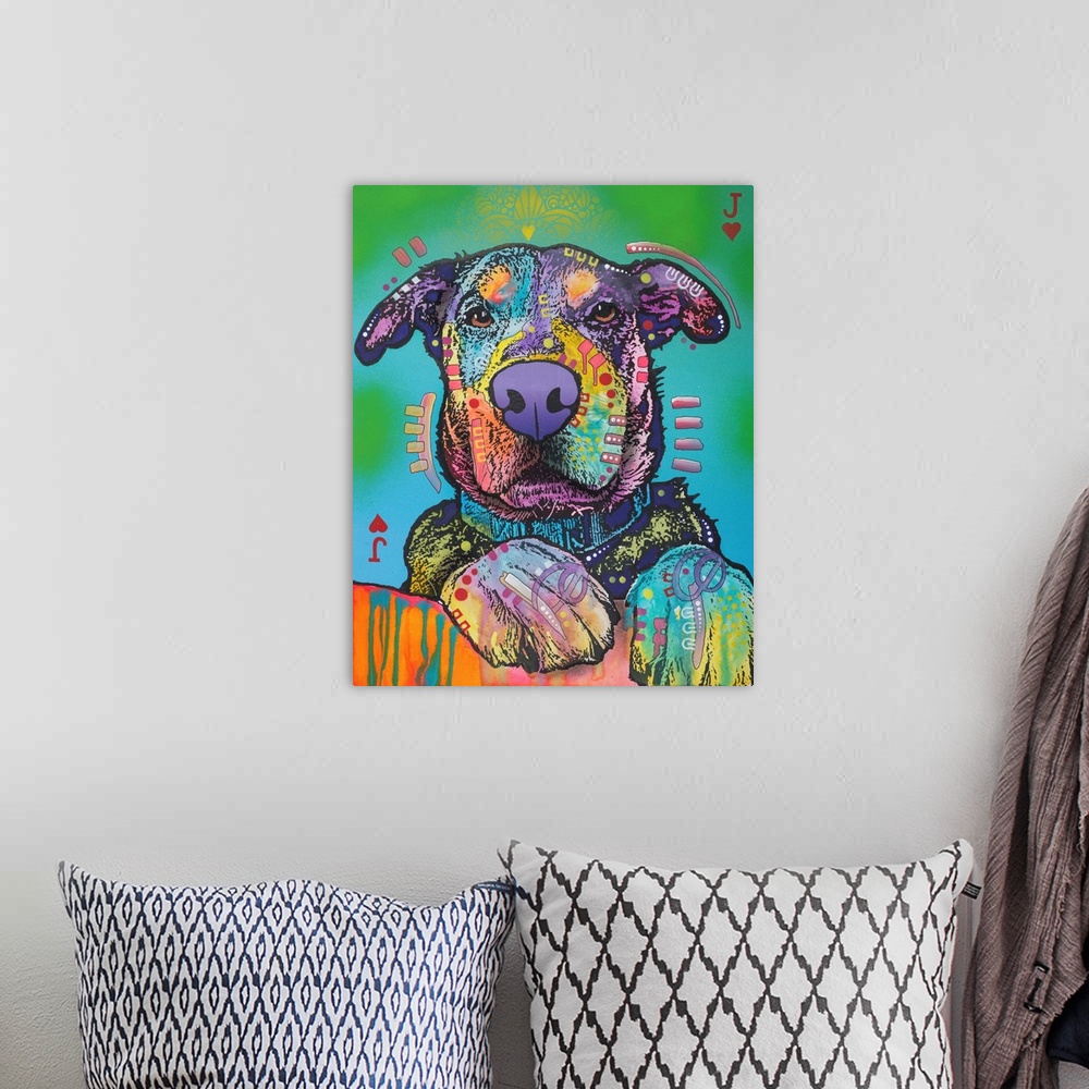A bohemian room featuring Colorfully designed painting of a dog with its paws in the foreground on a blue and green backgro...