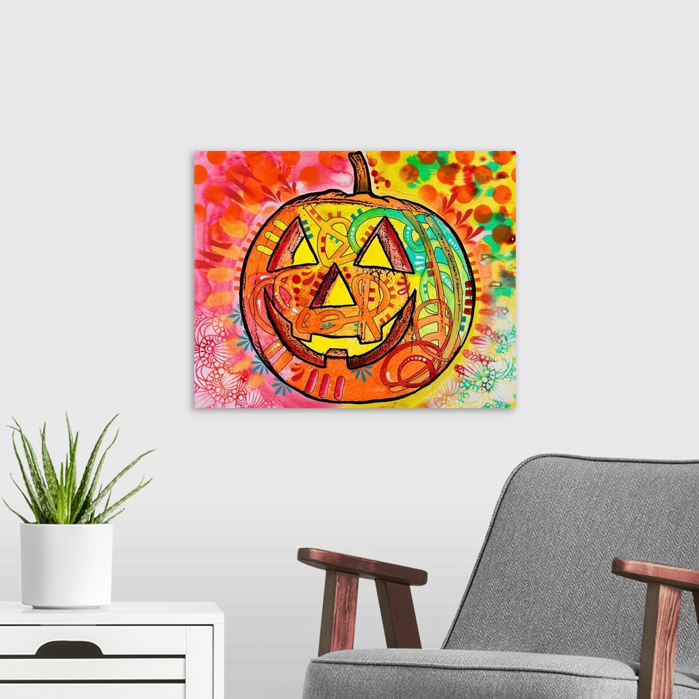 A modern room featuring Brightly colored painting of a jack o lantern surrounded by abstract designs.