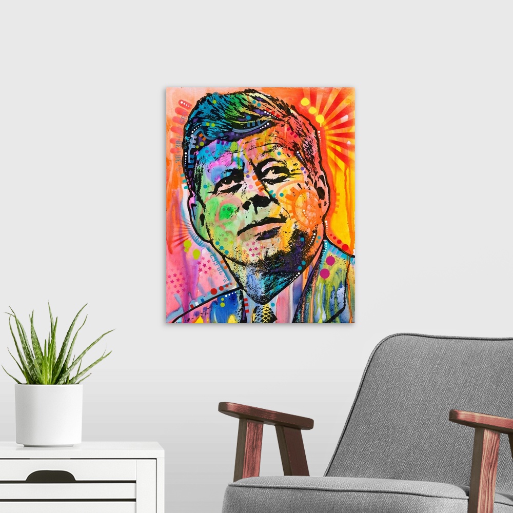 A modern room featuring Pop art style painting of John F. Kennedy with different colors and abstract designs all over.
