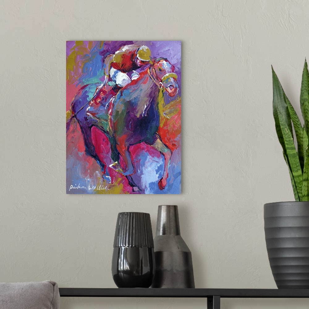 A modern room featuring Contemporary colorful painting of jockeys riding horses in a race.