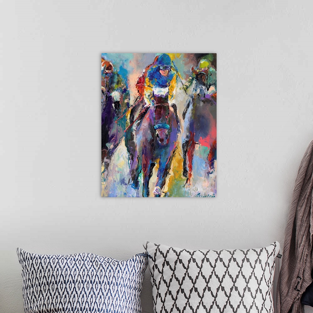 A bohemian room featuring Colorful abstract painting of jockeys on horseback.