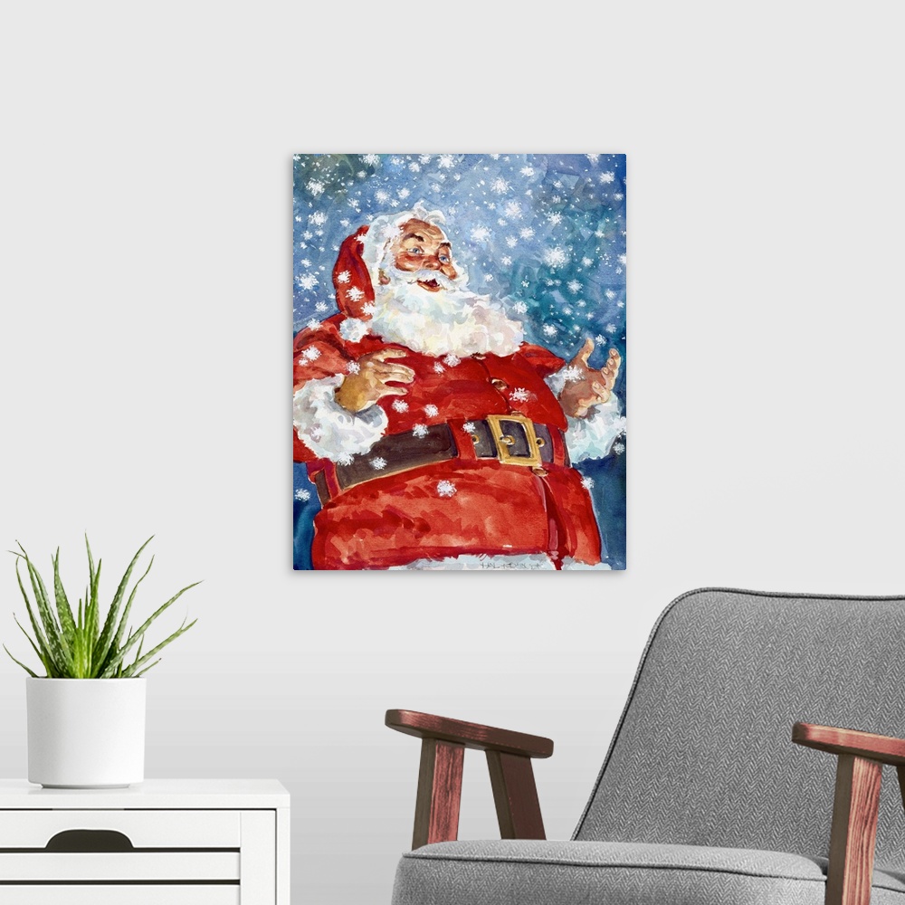 A modern room featuring A jolly Santa with snow flakes falling all around him.