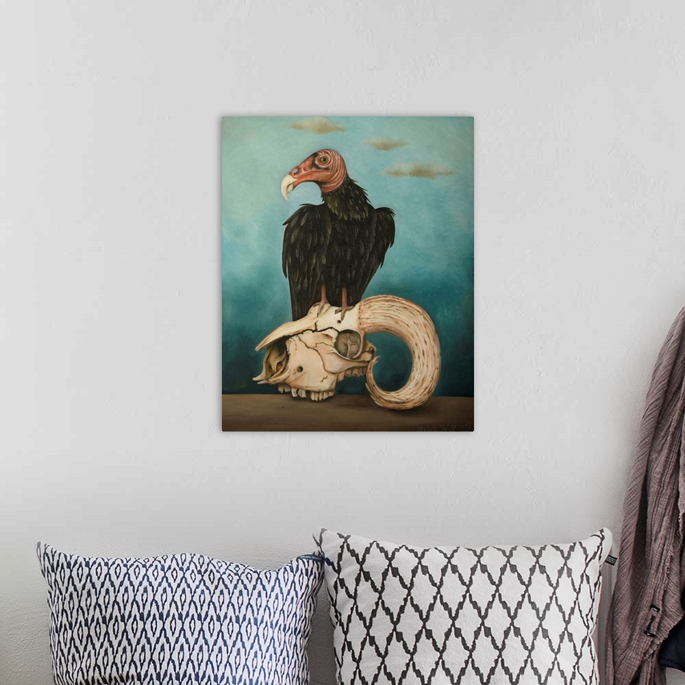 A bohemian room featuring Surrealist painting of a vulture sitting atop a ram skull.
