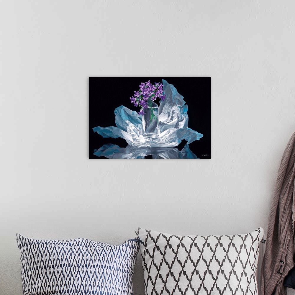 A bohemian room featuring Contemporary vivid realistic still-life painting of a clear glass vase holding purple flowers, wh...