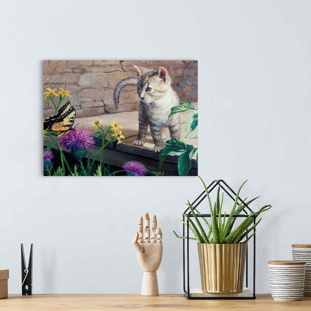 A bohemian room featuring Contemporary artwork of a kitten looking at a butterfly.