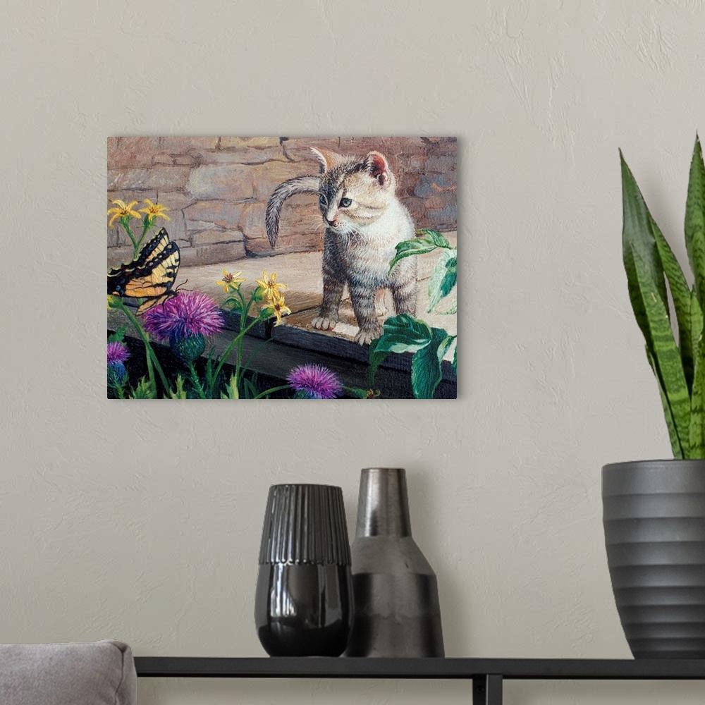 A modern room featuring Contemporary artwork of a kitten looking at a butterfly.