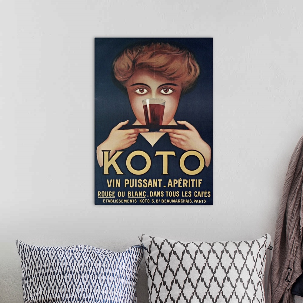 A bohemian room featuring Vintage poster advertisement for Koto.