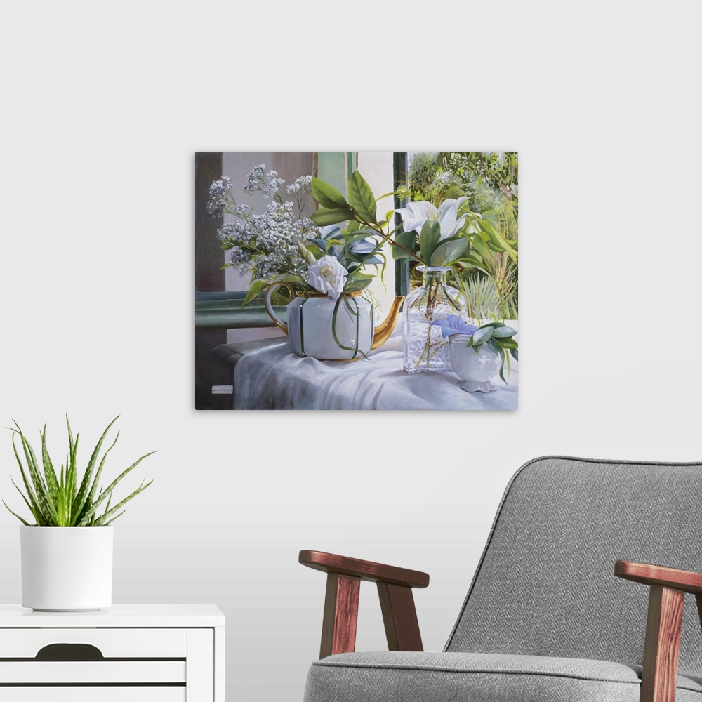 A modern room featuring Contemporary still life painting of a teapot and glass vase filled with flowers.