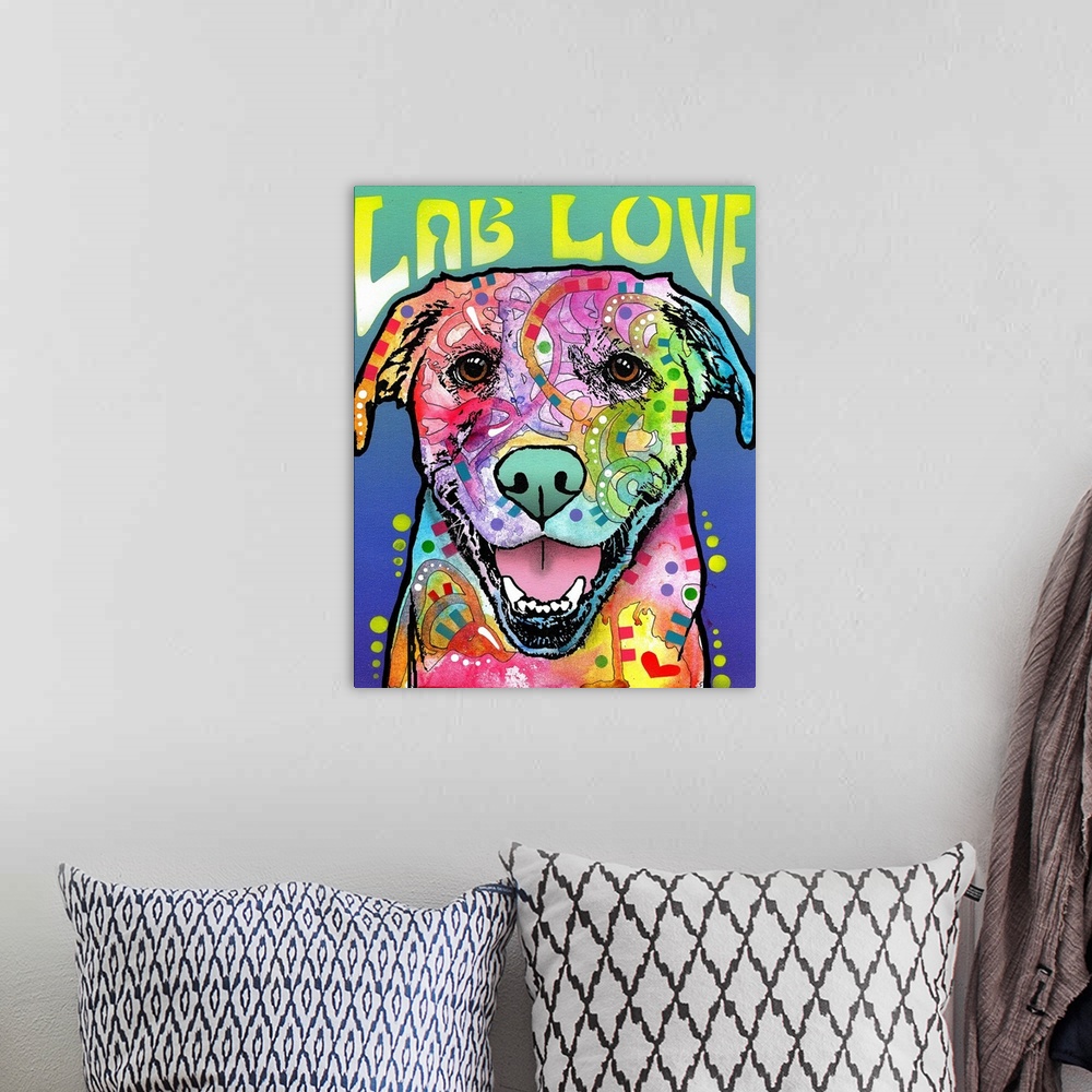 A bohemian room featuring "Lab Love" written around a colorful painting of a Labrador with abstract markings on a blue and ...