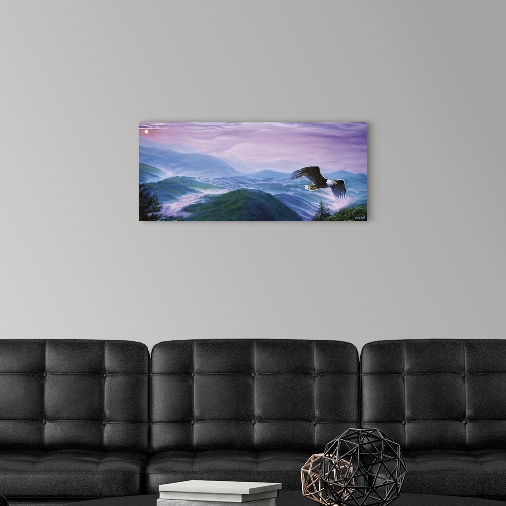 A modern room featuring bald eagle flying over mountain range