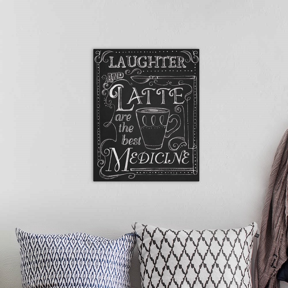 A bohemian room featuring Chalkboard-style sign with a cup of coffee that reads "Laughter and Latte are the best medicine."