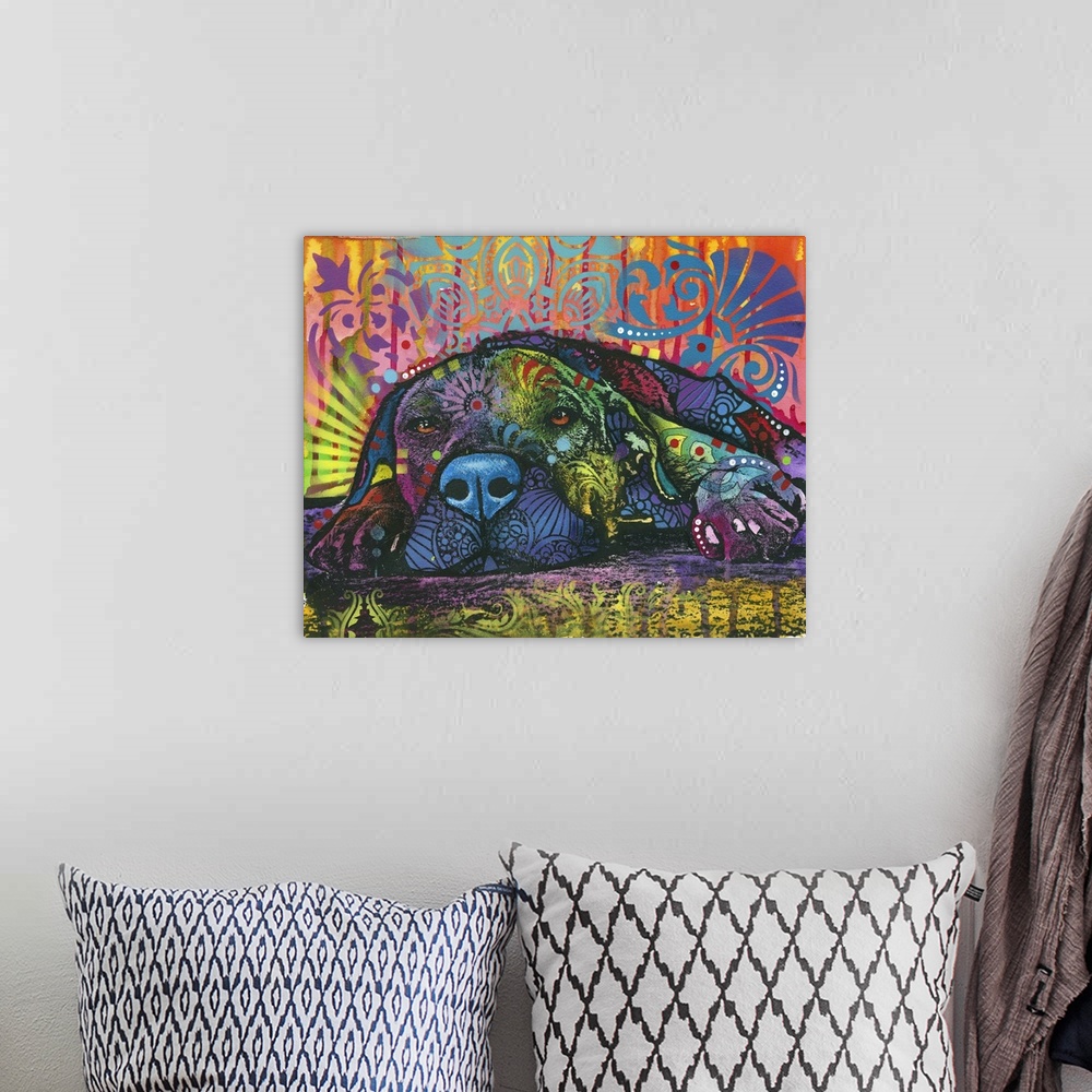 A bohemian room featuring Pop art style painting of a lazy dog laying down on the ground with various colors and designs al...