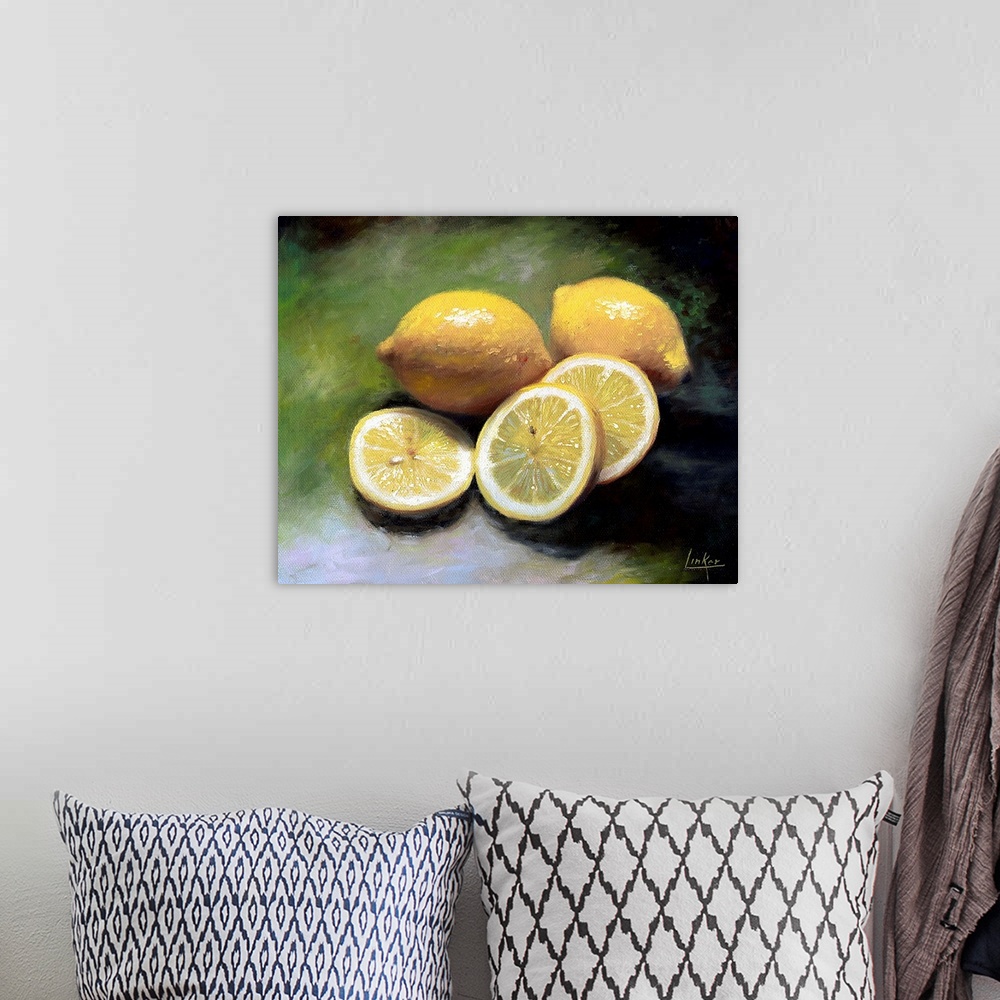 A bohemian room featuring Painting of lemons, sliced and whole, on a green background.