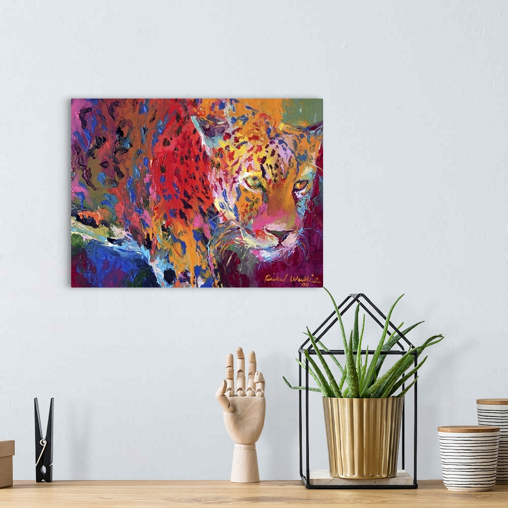 A bohemian room featuring Contemporary vibrant colorful painting of a leopard.