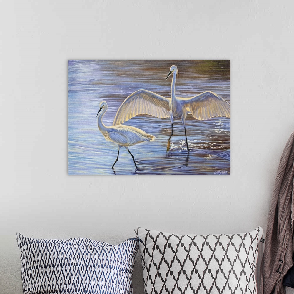 A bohemian room featuring Cranes on the water.
