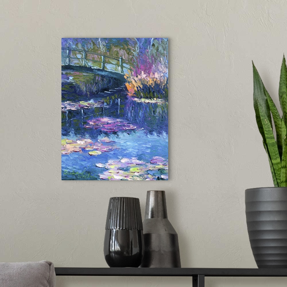 A modern room featuring Contemporary painting of water lilies under a bridge in a pond.