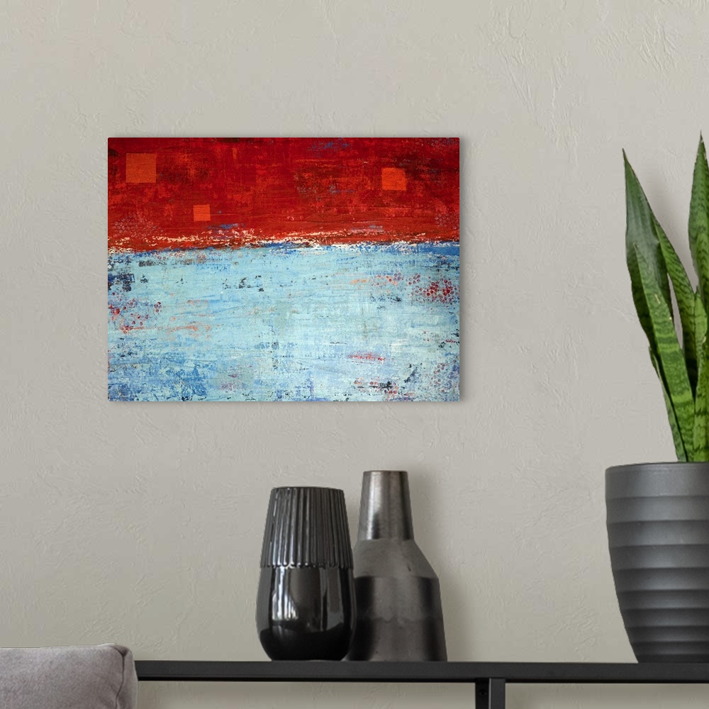 A modern room featuring Contemporary abstract painting in red, blue, and white.