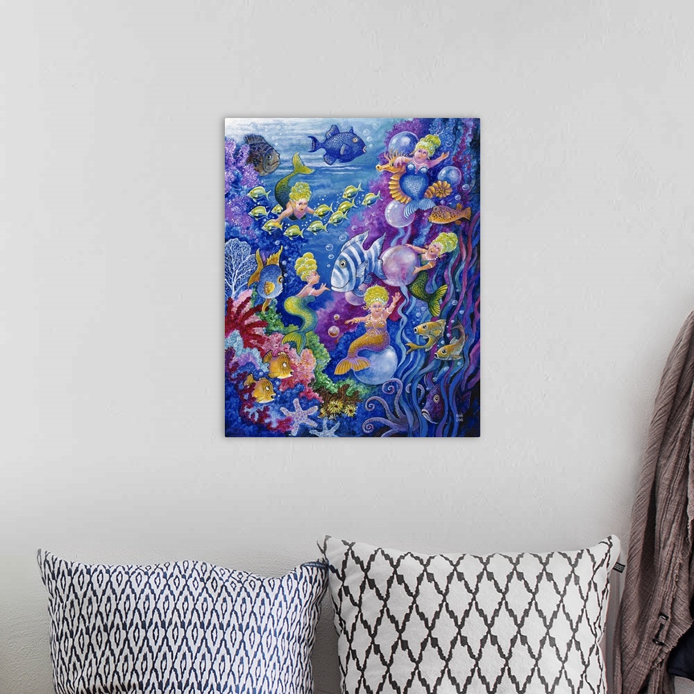 A bohemian room featuring Tiny little mermaids swimming around with the fish underwater.