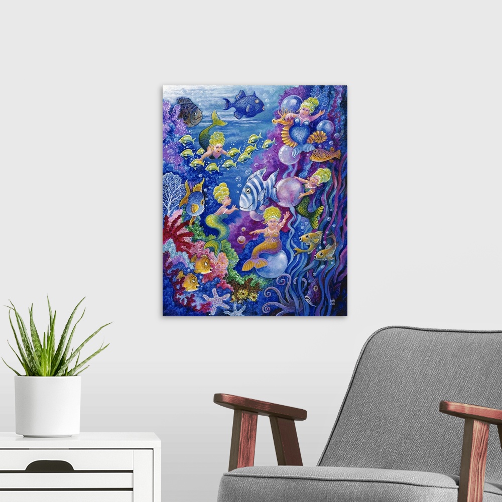 A modern room featuring Tiny little mermaids swimming around with the fish underwater.