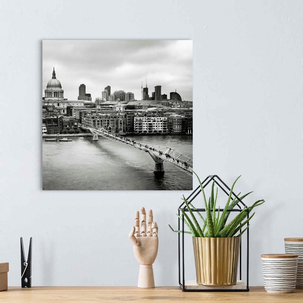 A bohemian room featuring London Millenium Bridge, black and white photography
