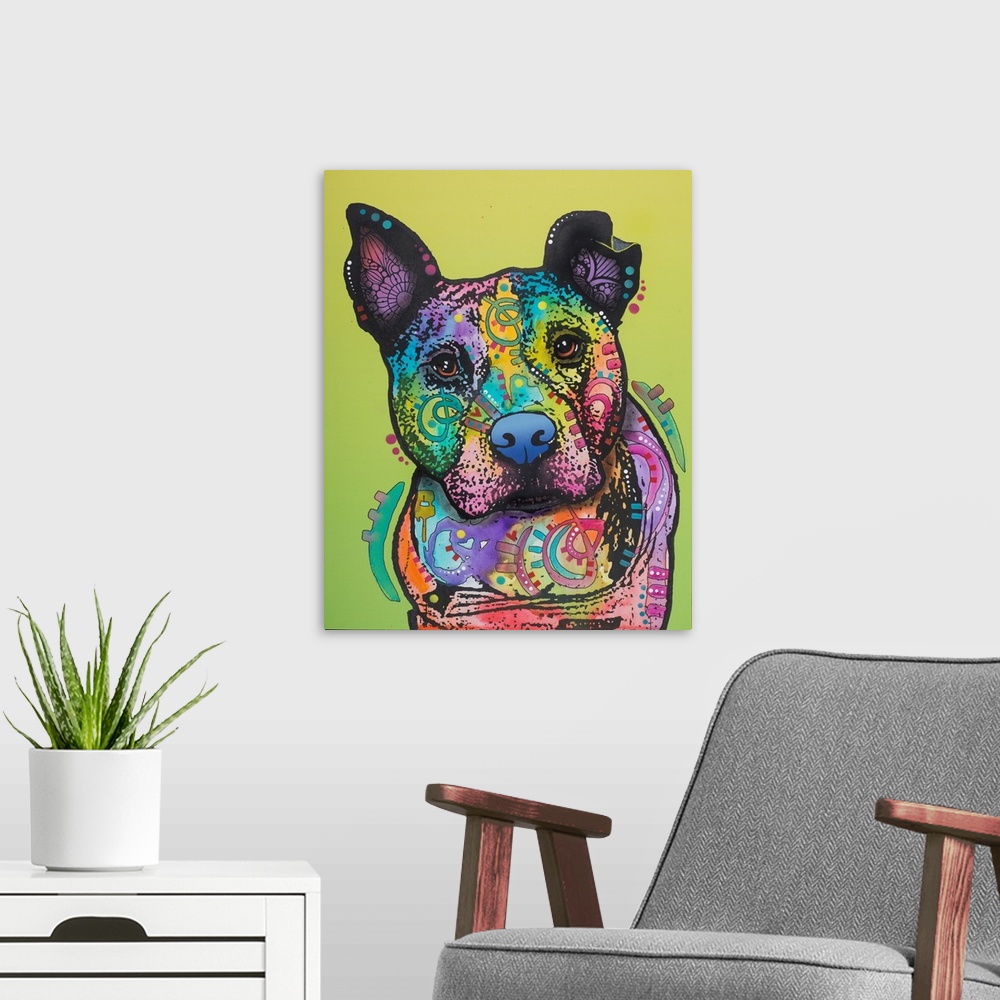 A modern room featuring Colorful painting of a pit bull covered in shaped designs on a yellow-green background.