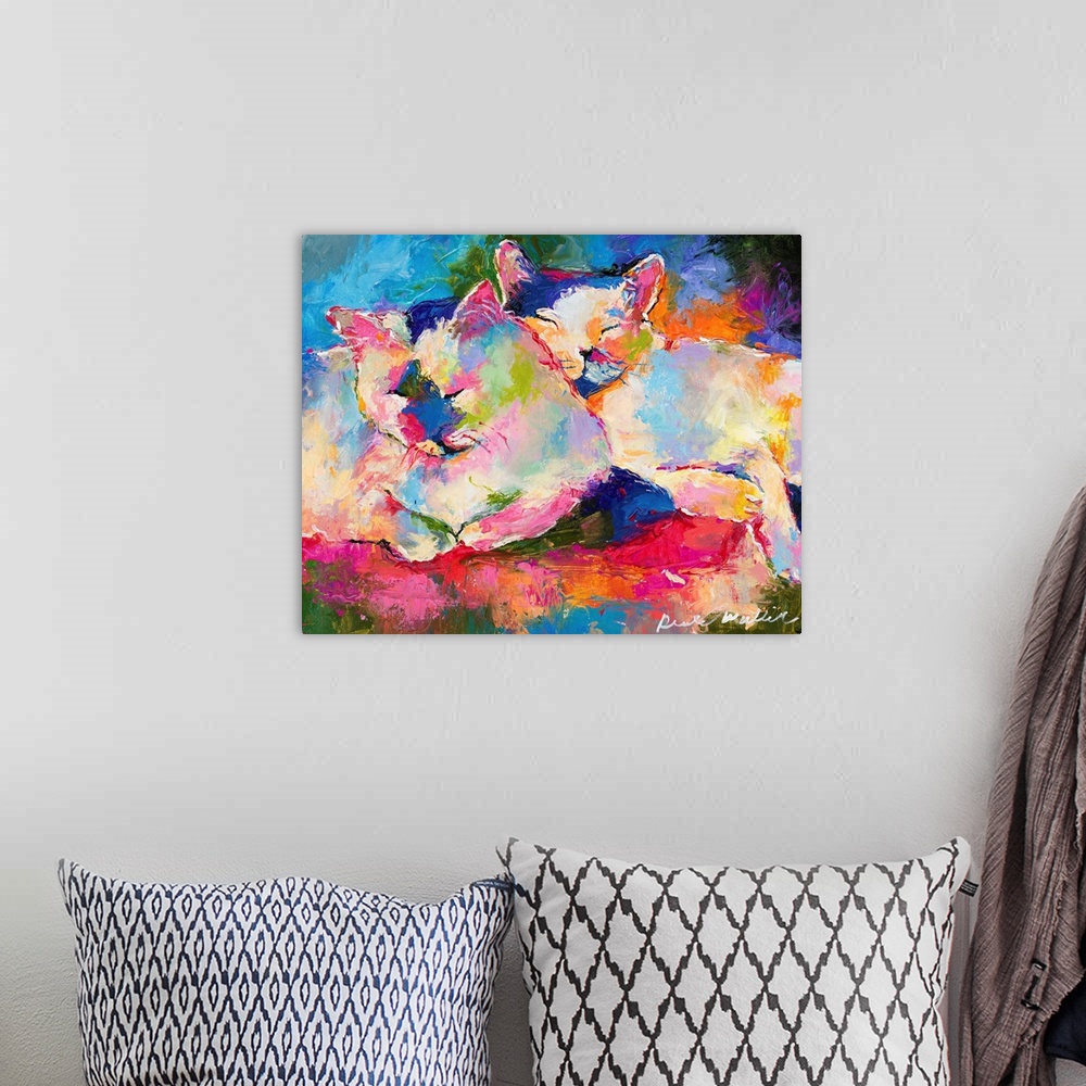 A bohemian room featuring Colorful abstract painting of two cats snuggling and sleeping together.